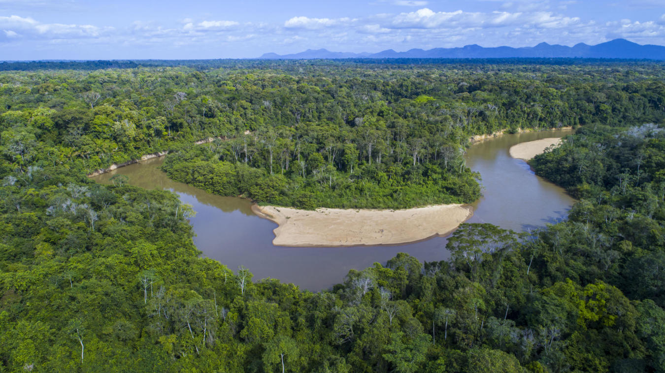 An aerial photo taken with a drone over the Kanuku Mountains Protected Area, Guyana. The Rupununi River flows from the mountains. © Daniel Rosengren