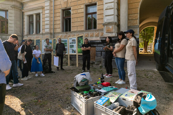 The delegation views ranger, monitoring, and environmental education equipment during a presentation at Skolivski Beskydy National Park.